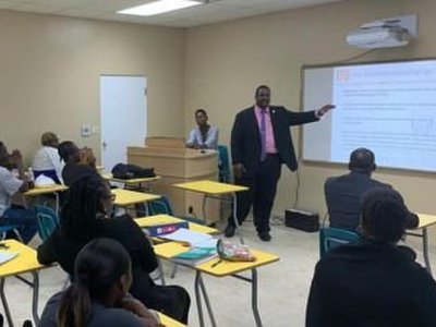 PHOTO of the Day: Premier Fahie & Hon Rymer mingle with HLSCC Students