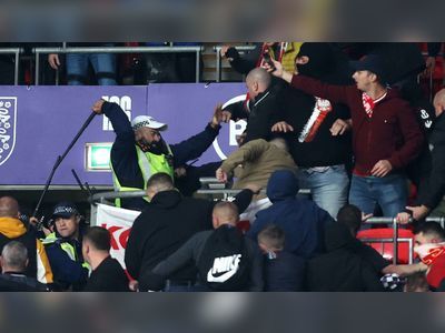 Hungary fans clash with police after 'racially aggravated' offence during England match at Wembley