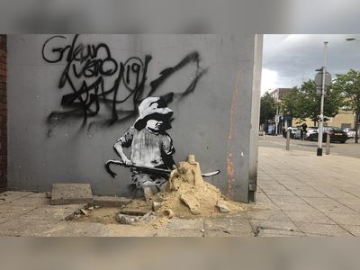 Banksy artwork removed from old electrical shop in Lowestoft