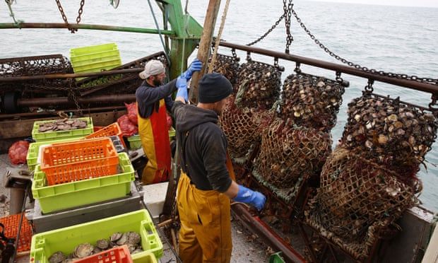 UK and EU settle fishing row but French fishers vow to go ahead with blockade