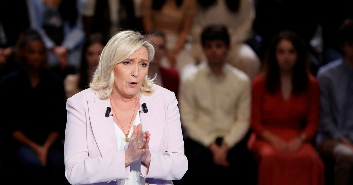 French presidential candidate Marine Le Pen heckled by protesters in Guadeloupe