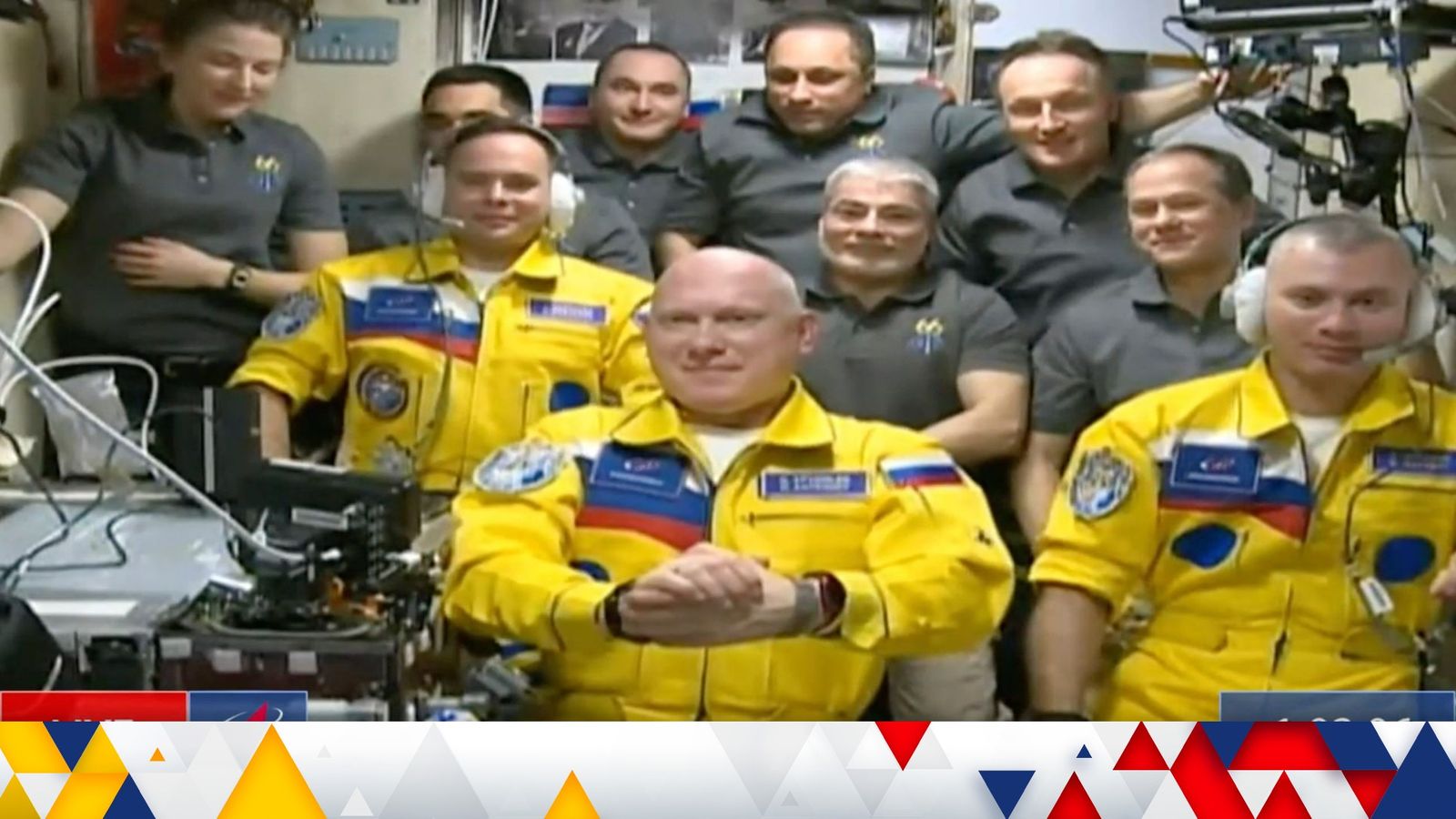 Russian cosmonauts wear Ukrainian colours while boarding International Space Station
