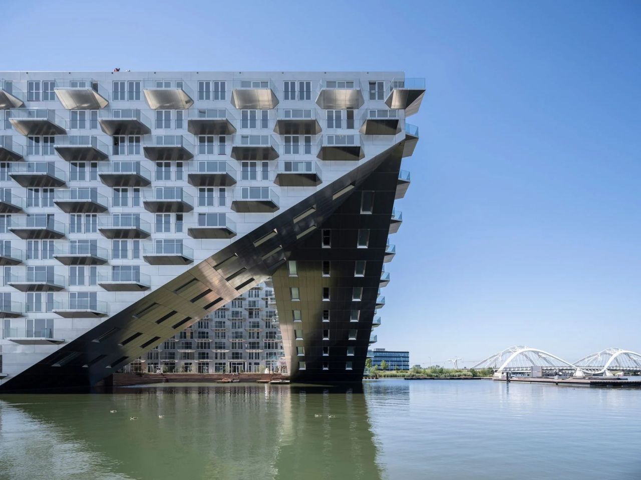 BIG and Barcode Architects unveiled the housing block on the Amsterdam waterfront