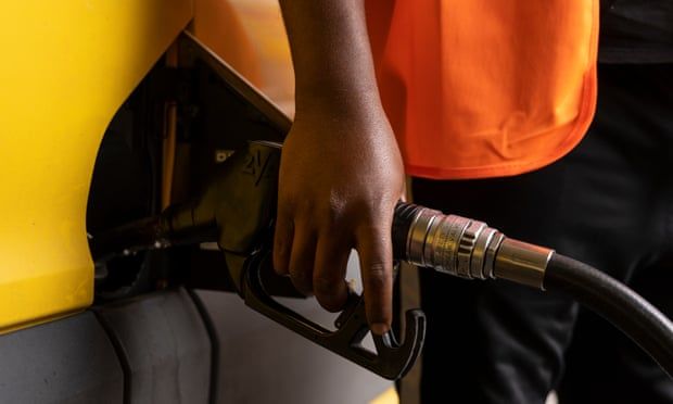 Petrol prices fall from record highs for first time in months