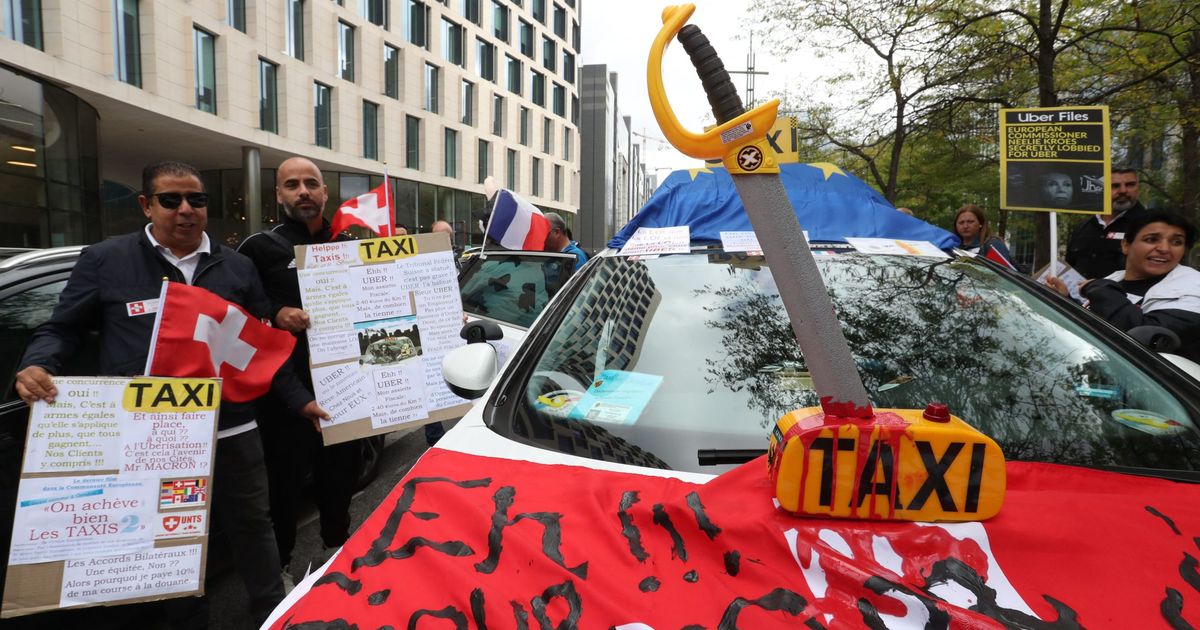 European taxi drivers block Brussels in Uber Files protest