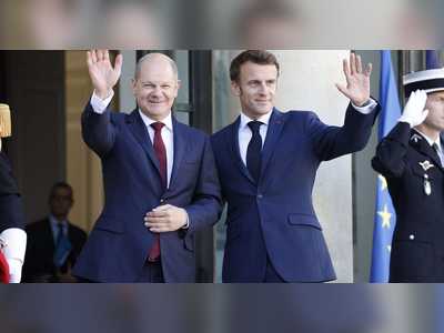Scholz and Macron threaten trade retaliation against Biden