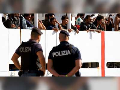 EU drafts plan to share migrant influx — voluntarily