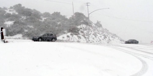 Los Angeles snow dusts Hollywood sign as winter storm tightens grip