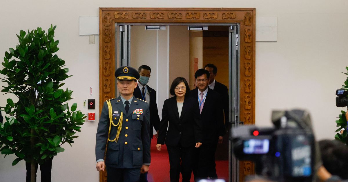 Taiwan president heads to U.S., China warns against meetings