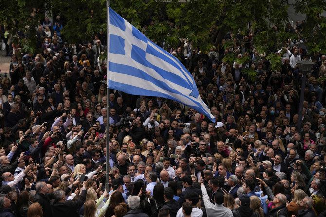 Out of bailout spotlight, Greeks feeling recovery pains at election